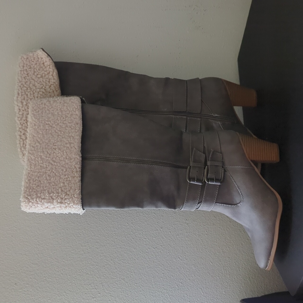 Tall heeled boots with fur on top